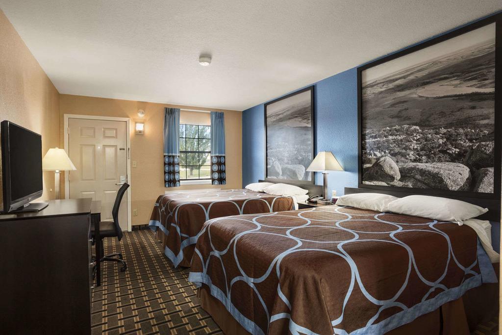 Super 8 By Wyndham Henryetta Motel Bagian luar foto