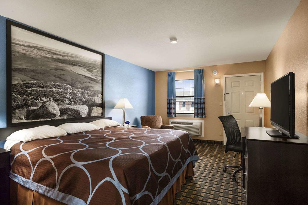 Super 8 By Wyndham Henryetta Motel Bagian luar foto